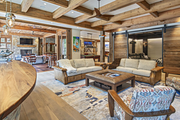 interior open concept living room media room wooden beams
