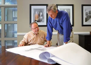 Scott and Steven reviewing plans