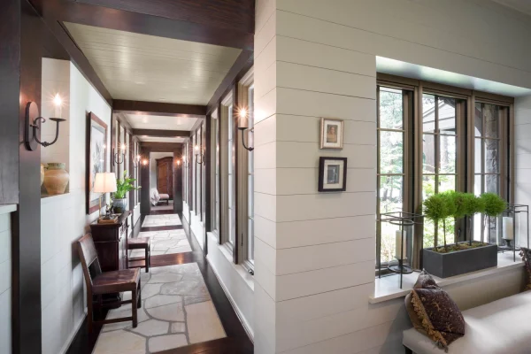 hallway with chairs and planter