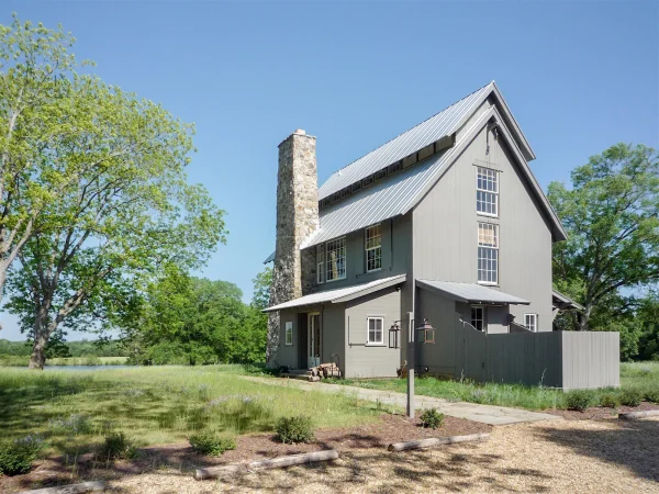 farmhouse exterior with fireplace